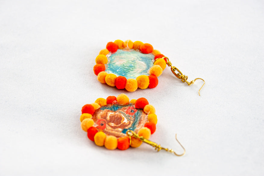 HOOP EARRINGS WITH ROSONE AND ORANGE POMPON