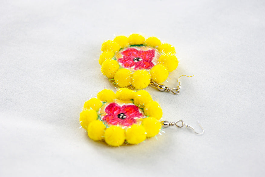 HOOP EARRINGS WITH ROSONE AND YELLOW POMPON