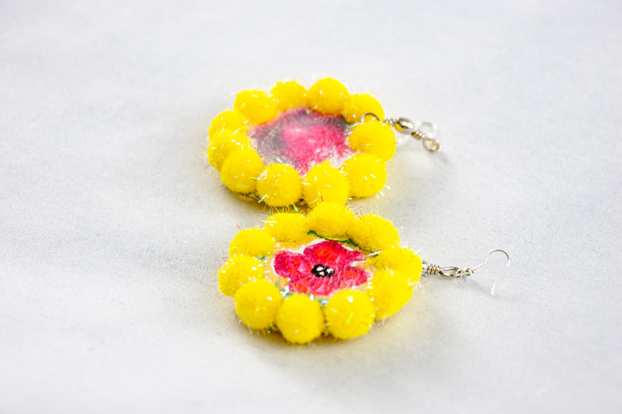 HOOP EARRINGS WITH ROSONE AND YELLOW POMPON